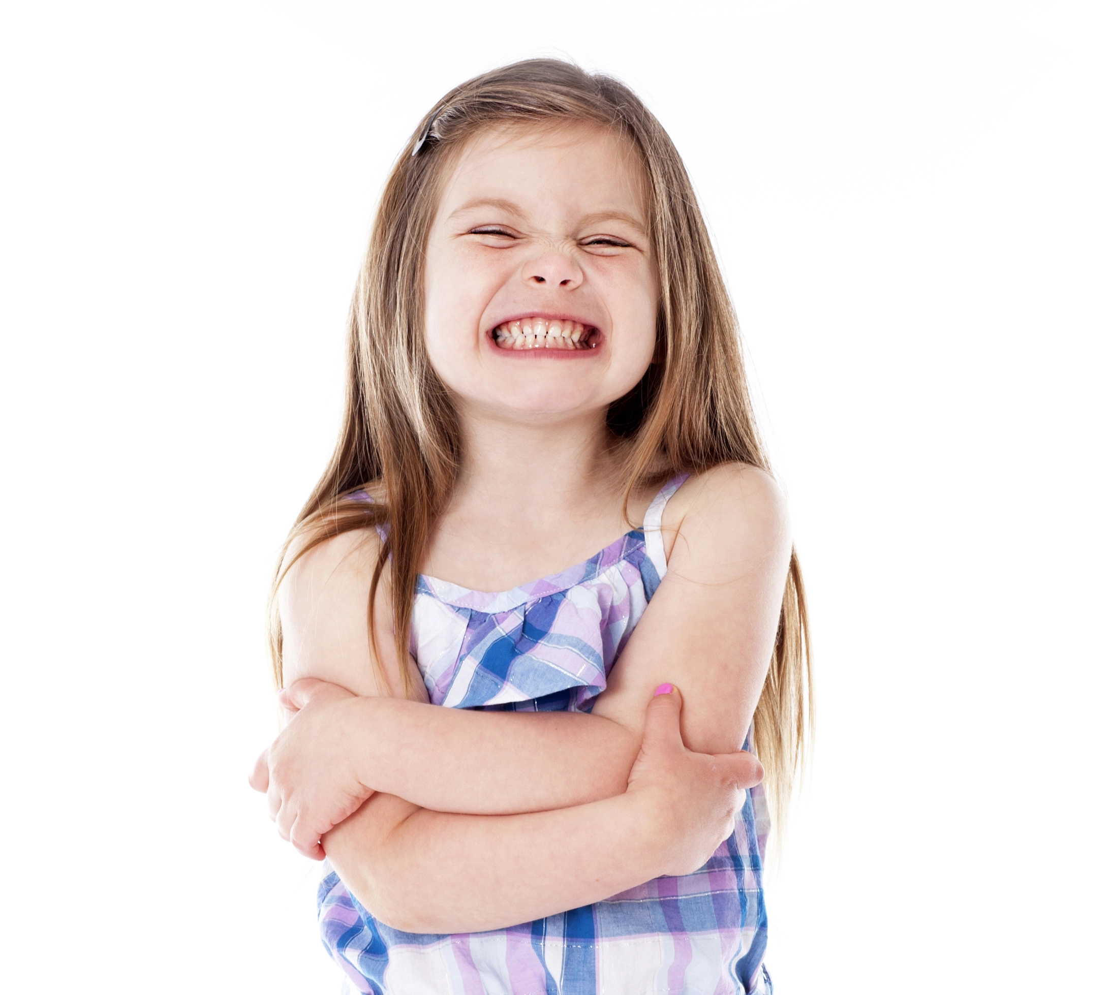 Young girl clenching teeth. 