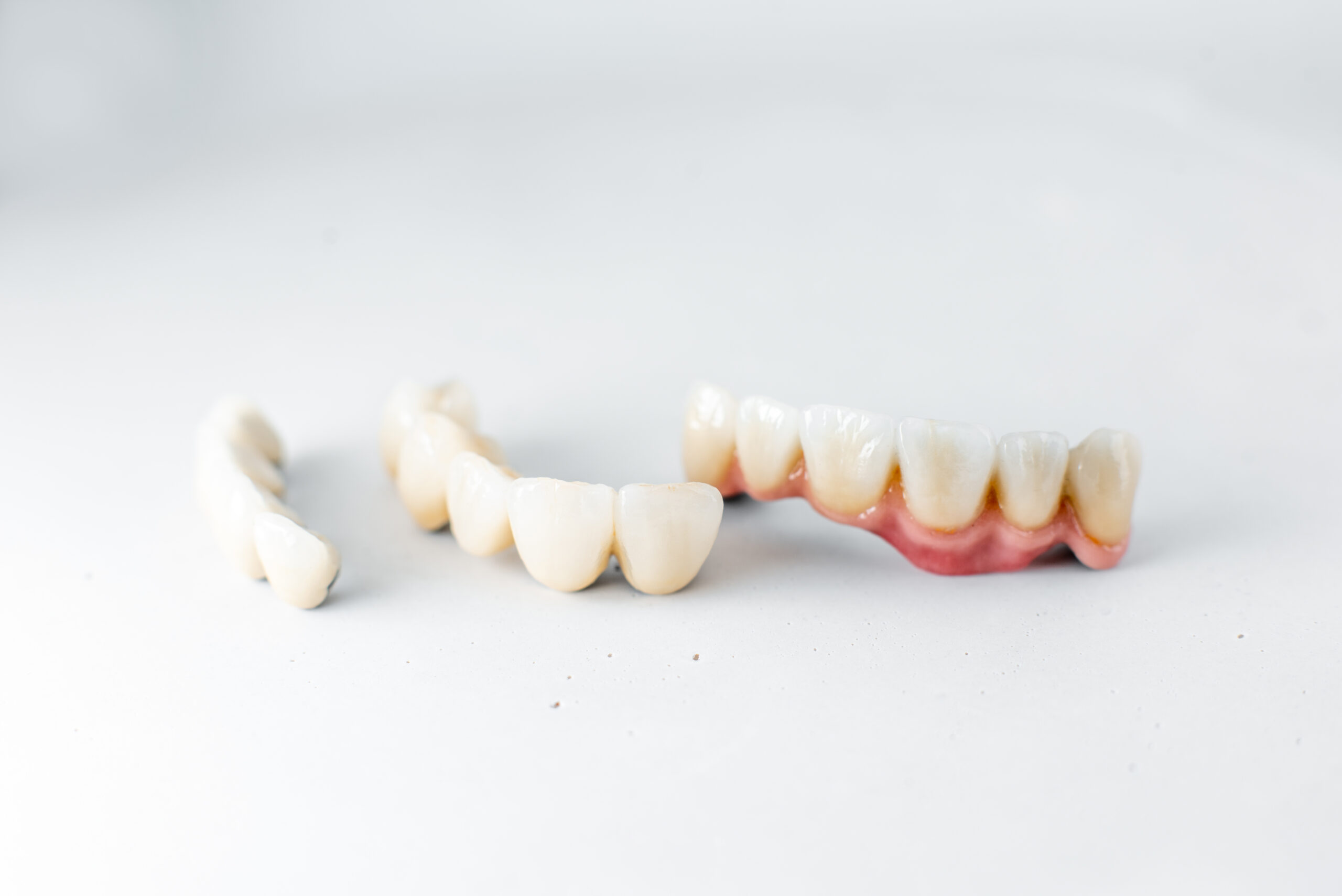 Dental Crown and partial dentures on a white background. 